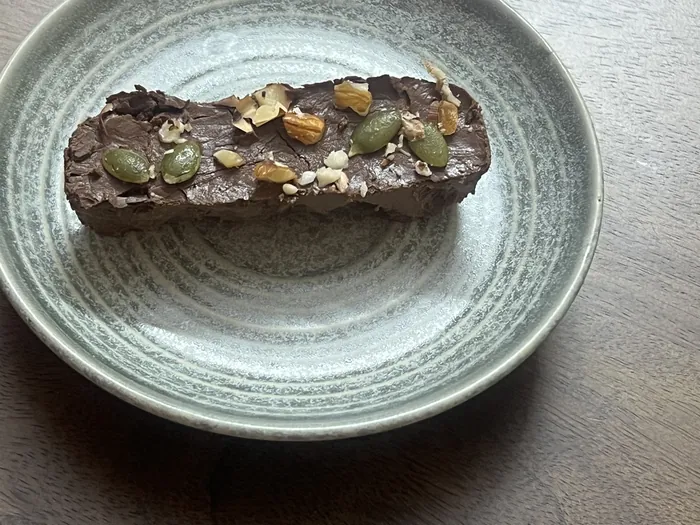 An in-house protein bar — seeds, nuts, no preservatives