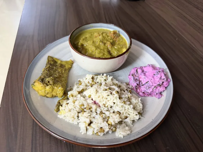 A thali — Mixed grain rice, Coastal Fish Curry, Beetroot raita 